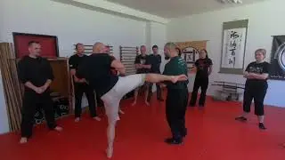 Spiral motion into partner's center of balance
