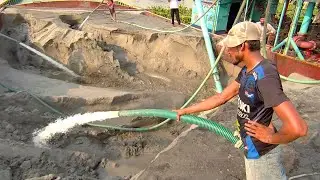 River Sand Pumping in Action: Moving Tons of Slurry with High-Powered Hoses