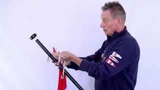 Hoe hijs je de vlag halfstok op een vlaggenstok