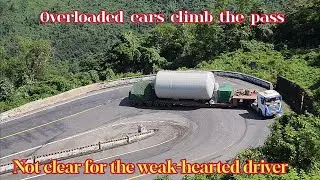 120-ton overloaded tractor-trailer climbs the dramatic pass