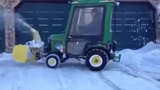 John Deere 455 with a snowblower