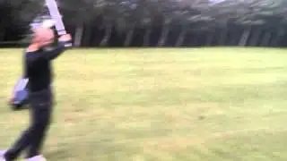 Little having a go at golf. Try not to laugh.