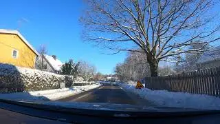 Time Warp Green Screen Background drive on snow-covered winter roads through a small community