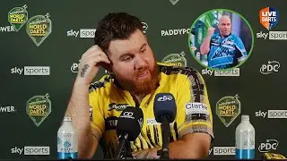 Scott Williams reacts to Rob Cross' CRUDE GESTURE on stage during World Championship clash