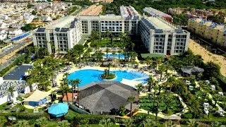 Hotel Estival Islantilla ****. Rondleiding door tuin, zwembaden, lobby en restaurant.