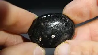 Nuummite cabochon.  RNUU52