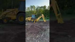 Lot 802   John Deere 310D Backhoe