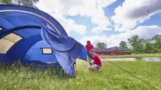AcroYoga in a Tie building the tent at #AcroBhakti nordic Festival