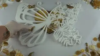 I MADE A BUTTERFLY WITH FLOWERS PICTURE FROM RESIN.