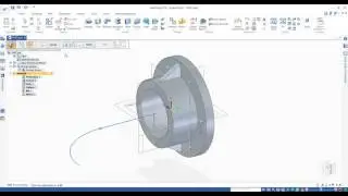 Using Sweep Protrusion command to add an elbow feature to the model