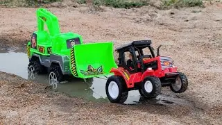 Excavator stuck in mud and rescue by farmtrac | Excavator stuck video  | Toyz Ology