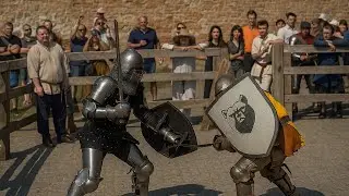 Medieval Duel of Steel: Women Knights in Full Armor Sword Combat