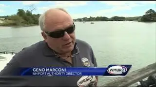 State works to remove stranded boat