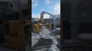 Wheel Loader Snow Blower Clears Street Snow