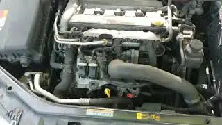 2005 Saab 9-3 playing with plasti dip on engine bay