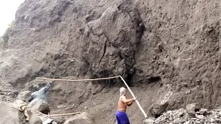 THE STRUGGLE TO DROP A LUMP OF SAND 