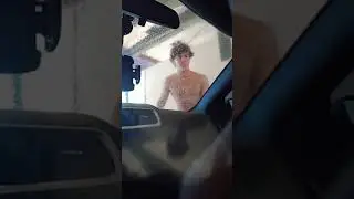 At the carwash with shirtless men