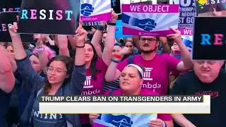 Trump signs memo banning transgender military recruits