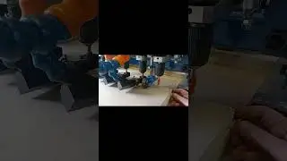 Spring loaded hold down wheels
