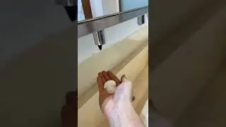 Behind the mirror soap dispenser