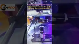 This two-color screen printing machine can handle a variety of bottle shapes.