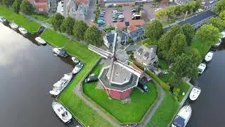 4K Raw Drone Footage of a Windmill at the city Dokkum