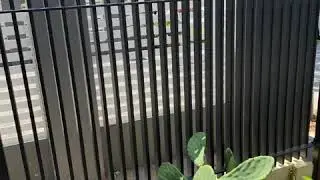 Modern black aluminium blade fencing