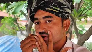 Dina Khan, Barmer, Rajasthan.                   Playing Morchang.
