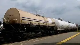 CN 397 w/ CN Engines 2991, 3094 & 3835 lead this long WB Mixed Freight train by Georgetown GO/VIA