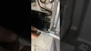 Fixing a refrigerant leak on a KitchenAid refrigerator. #HandsomeOrHandy