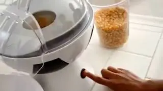Máquina de palomitas de maíz en forma de balón Soccer Haciendo palomitas