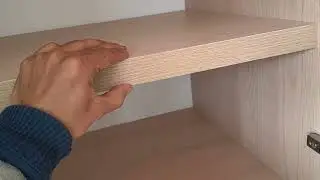 Diseño de closet en L con centro de entretenimiento o mueble de Star 