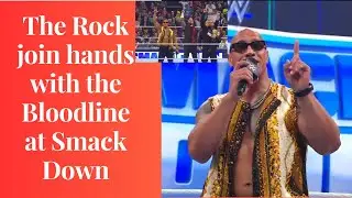 The Rock  join hands with the Bloodline at Smack Down | The Rock is part of Bloodline now