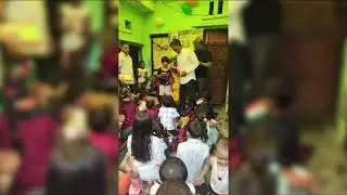 distribution children gift and notebook stationery items pen pencil edit.. Children at SLUM.