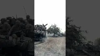 US Tank Riding Infantrymen Advance