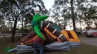 Dinosaur Bounce House Full Set Up and Take Down. Stake Pulling Tips!