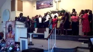 Apostle Alexander Thompson & Choir singing