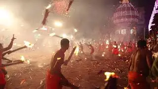 Men set each other on fire during Agni Keli festival
