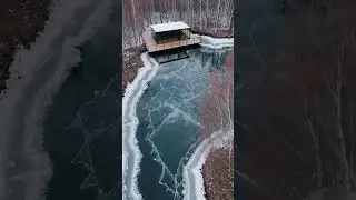 Would You Stay in This Frozen Lake Cabin? #GlassCabin #WinterEscape #DroneView #ModernRetreat