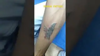 name cover up tattoo , feather tattoo , vel tattoo