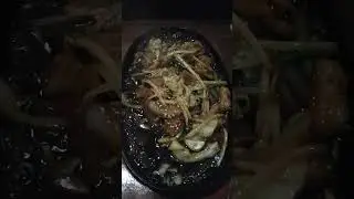 Sizzling Japanese horumon teppanyaki at izakaya in Fukuoka