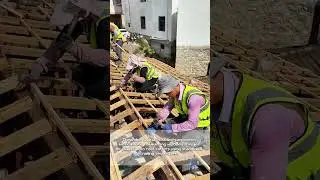 Roofing Craftsmanship: Workers Hand-Nailing Wooden Roof Structures