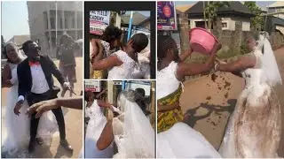 Angry wife storms husband's white wedding with side chick 🐣