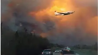 just minutes ago! Record heat and wildfires smith and slave lake,Fox Creek Canada