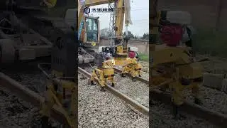 Double head Ballast is tamping on the rail track #railtrack #ballast #tamper #tamping #equipment