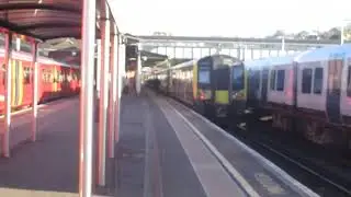 That Is a SWR Class 450100 And 450027 And GWR Train Class 165104 In Guildford