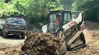 1 full hour of moving dirt with skid steer.