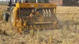 Swaraj 855 seeding wheat with happy seeder