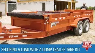 Securing a load with a dump trailer tarp kit