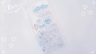 ボンボンドロップシールをスマホケースに黙々とぺたぺた。
